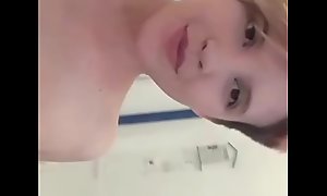 Young chick show her small tits and sexy body