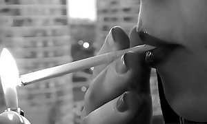 Mistress is smoke and crush cigarette