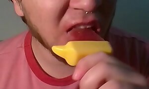 Desperate gay boy sucks popsicle 'til it's over